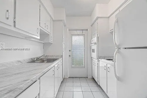 Building Photo - 12655 NE 16th Ave #16