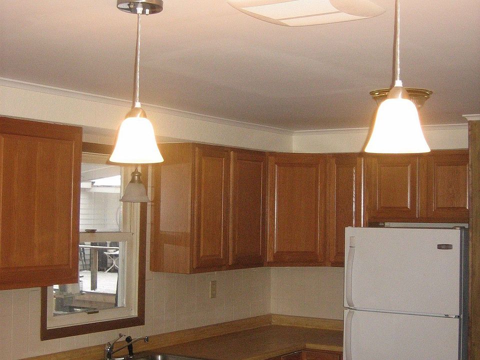New kitchen! New cabinets, wood floors and lighting. All appliances stay!