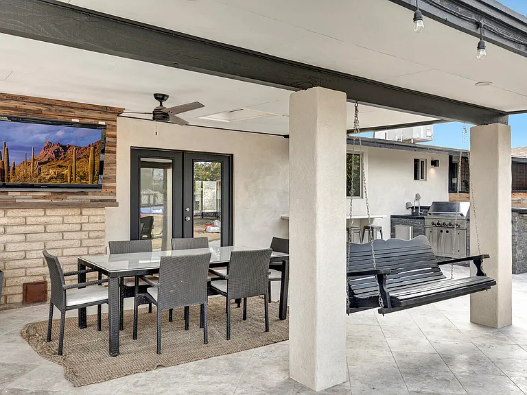 Covered patio, BBQ, wet bar.