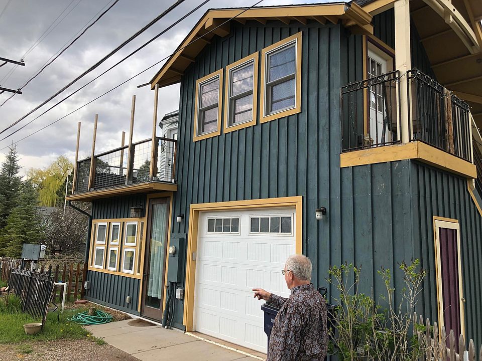 One car garage and balcony. Downstairs south facing green room