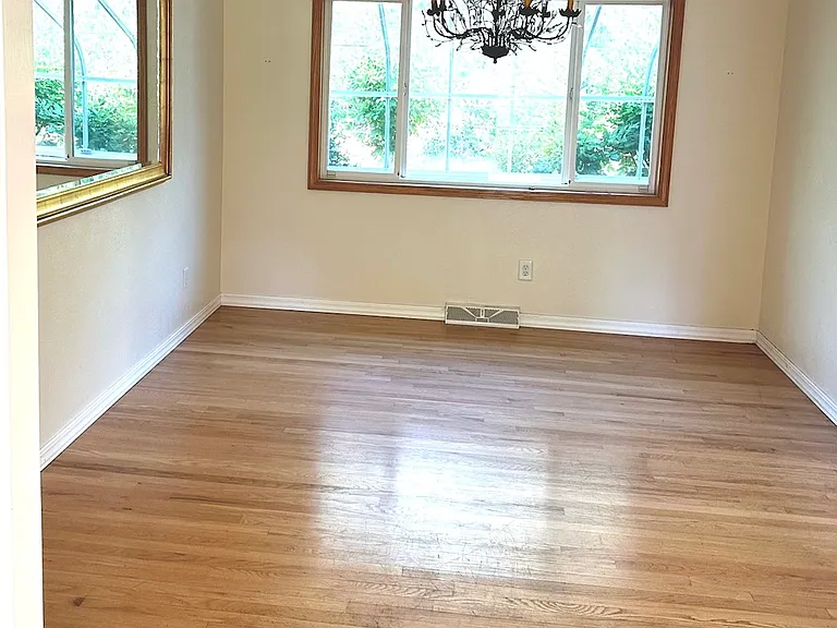 Dining room viewed from living room. kitchen is to the right