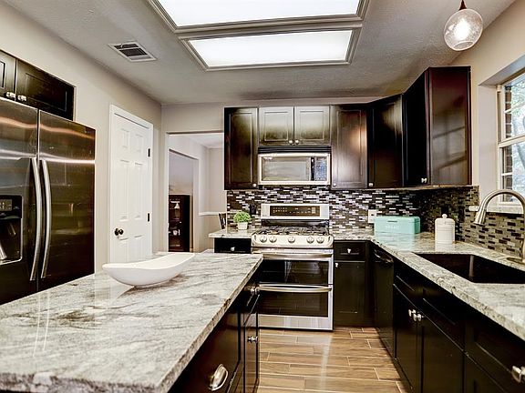 Room for everyone to help on the gorgeous kitchen island.