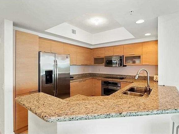 3rd image of 14951 Royal Oaks Ln APT 904