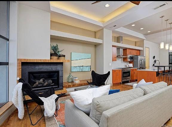 Open living room/kitchen/dining room on second level