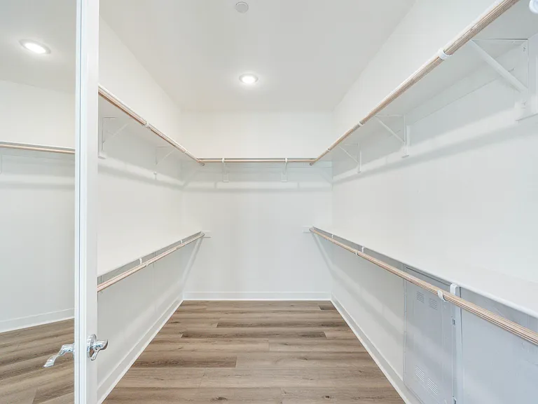 You will have more than enough space to place your belongings in the expansive walk-in closet.