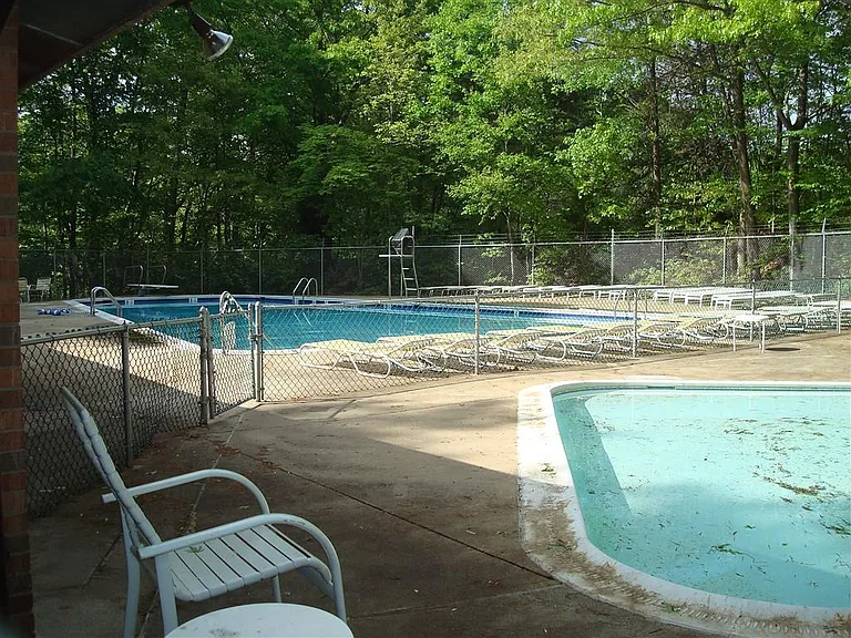 Pool (usually cleaner--pic taken when pool was not yet open!)