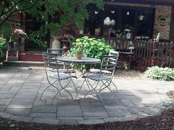 Front Patio
						:
						Charming sitting area for morning coffee and newspaper.