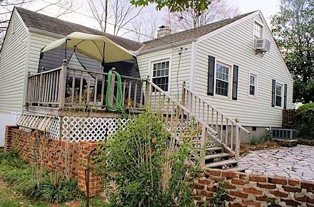 Rear deck & brick walled courtyard