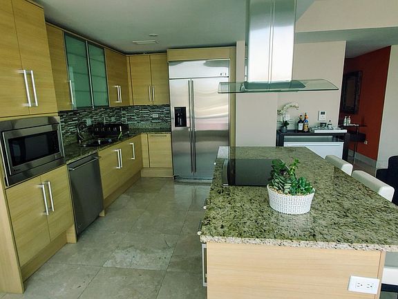 kitchen layout oven (not shown) below the kitchen range and island