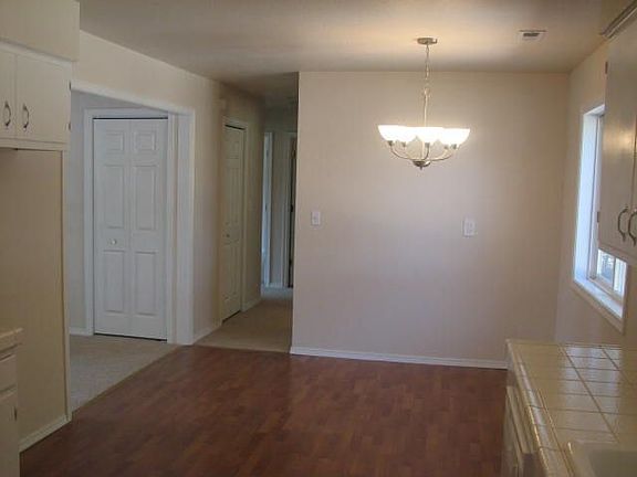 DINING ROOM NEW LAMINATE FLOOR