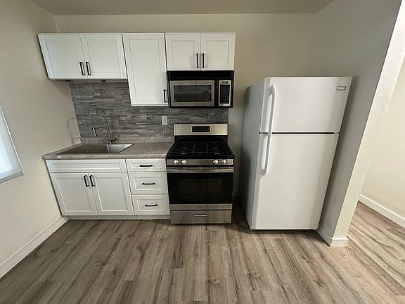 2nd image of 9820 Woodman Ave #A
