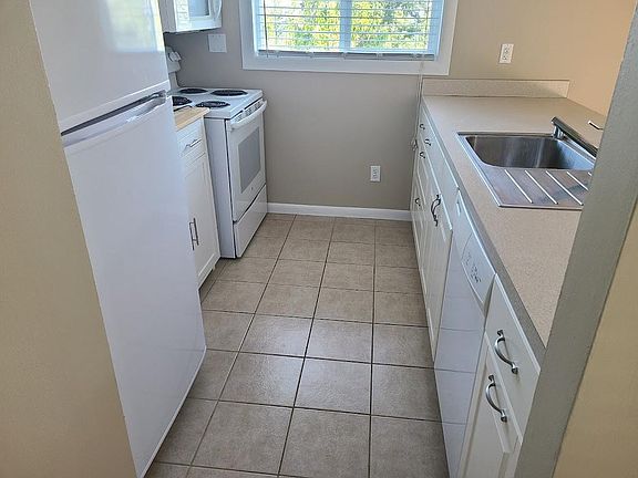 New refrigerator. Nice cabinets.