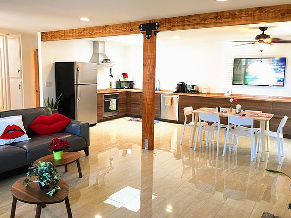Modern Rustic living room and kitchen with open concept and convenience in mind