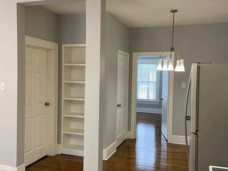 Custom Built-In Bookcase with Pantry for all your essentials and decor.