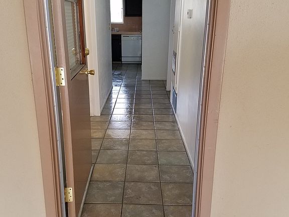 hallway from back door to kitchen