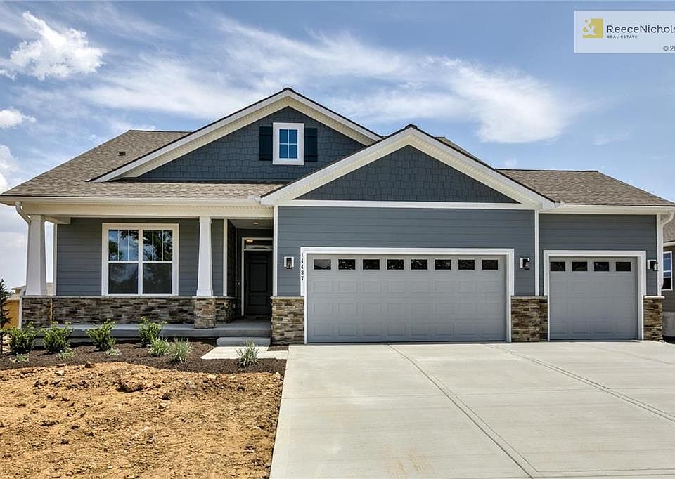PICTURES OF ACTUAL HOME! Darling craftsman exterior with front porch.  House will receive sod and sprinklers very soon!