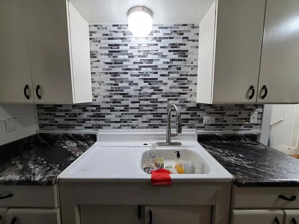 Recently added backsplash behind sink - 212 N Central Ave #2