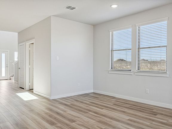 Dining Room in the Willow home plan by Trophy Signature Homes - REPRESENTATIVE PHOTO