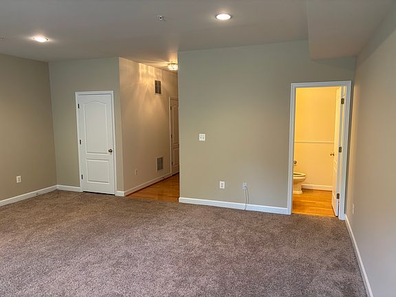 First floor den area showing half bath.
