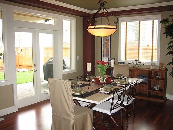 Dining Room opens to covered deck and private backyard-