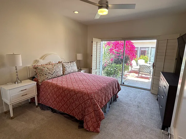 Bedroom #3 with attached bathroom
has view of private landscaped courtyard.