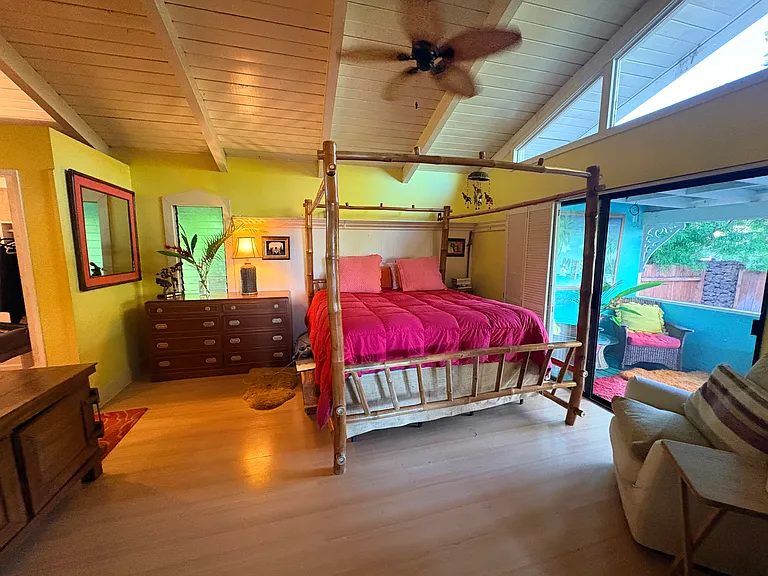 Master Bedroom, walk in closet and private walk in shower. Access to the lanai with outdoor seating.