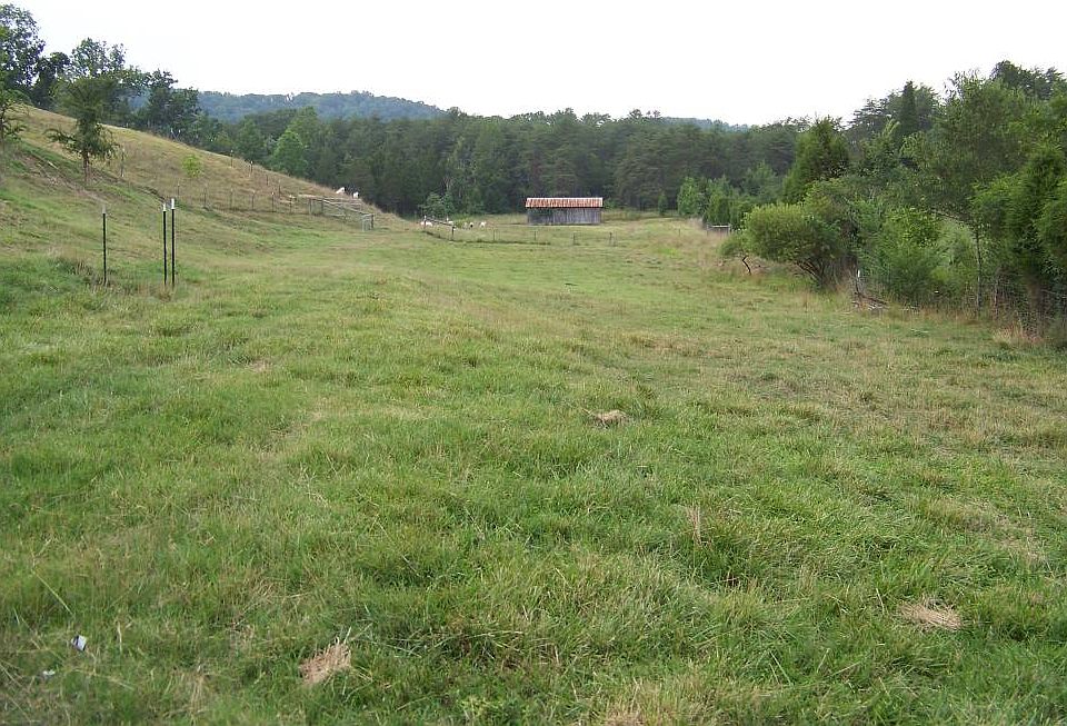 House is on hill to left