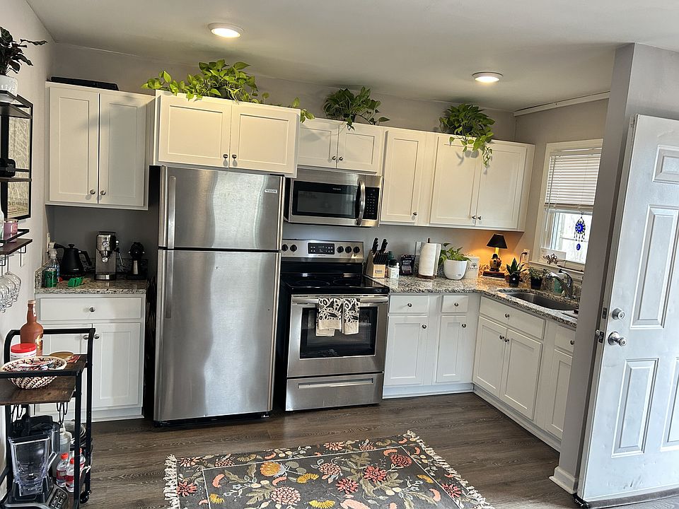Remodeled Kitchen with granite counters and new appliances.