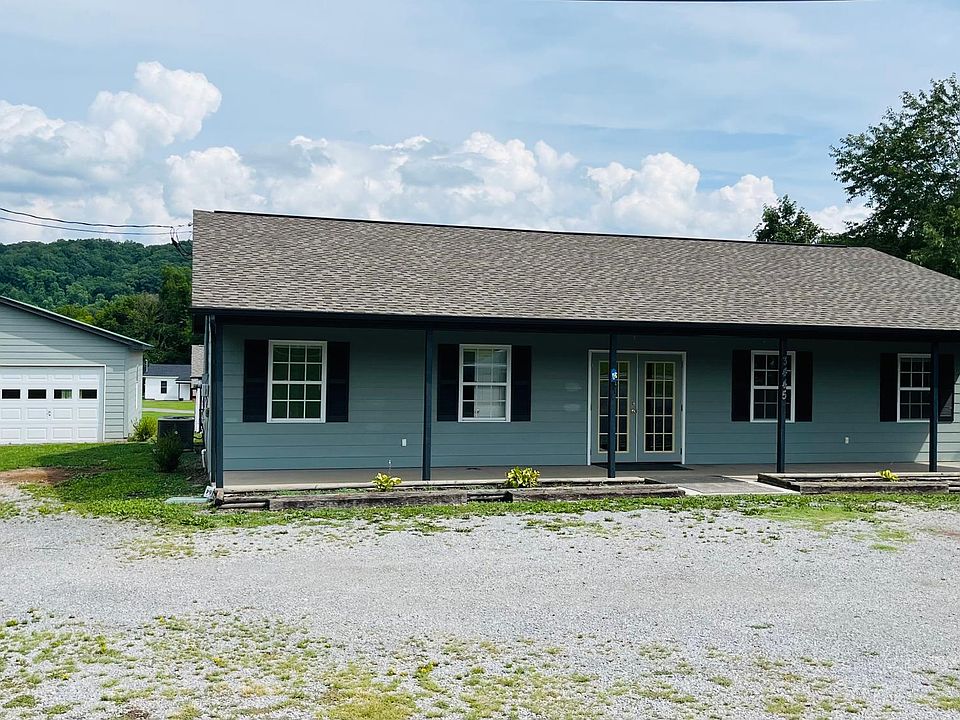 Front of home and 2 car garage