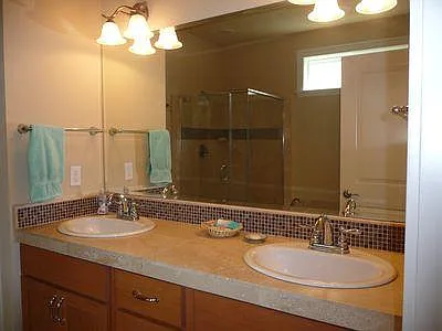 Master bath with travertine floors and counters.