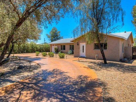Front of home; painted circular driveway