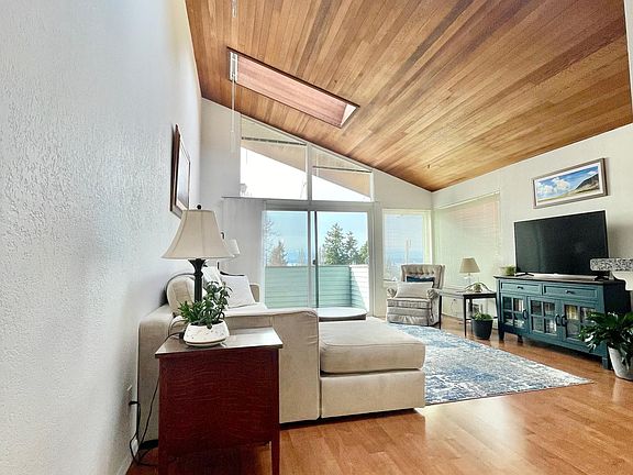 Enjoy water and Mountain View_s from the private deck off the living room.