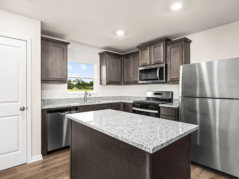 The kitchen has a convenient island.