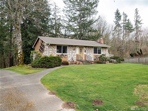 The owner has enjoyed this home for years. Yes, the home inside and outside are decorated with his artwork he has made, but will be removed at closing. 