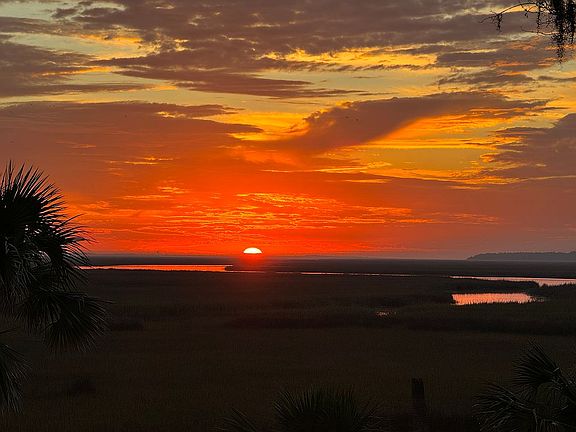 Sunrise off back porch 