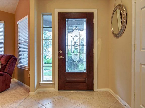 Upon entering through the leaded glass front door, you will find the study to your right, coat close