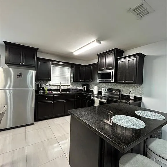 4710 N Ebony St — Photo 3