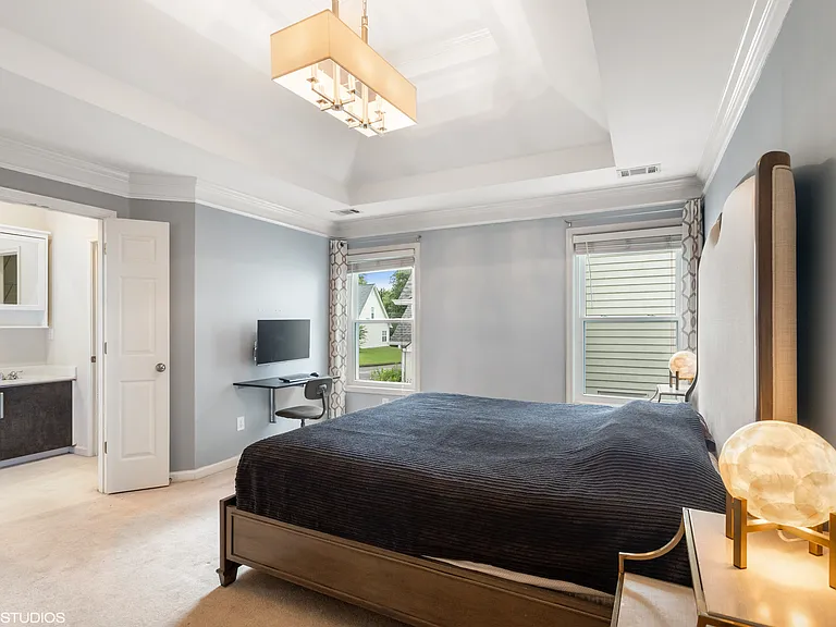 Master bedroom, here shown furnished. Note, since this picture was taken, the upstairs carpeting was replaced with solid white oak hardwood floors.