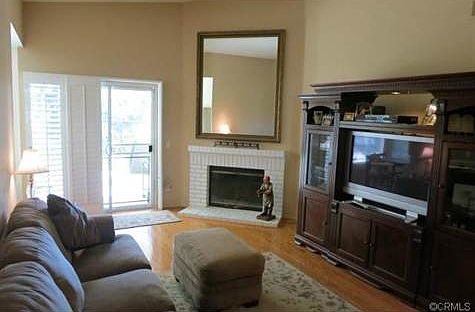 Family Room with high ceilings and access to back yard.