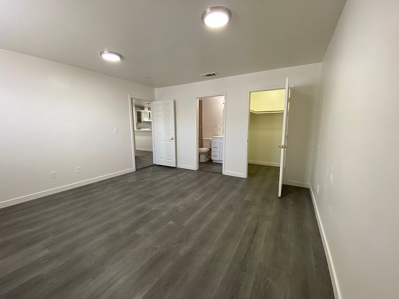 Master bedroom with walk-in closet and bathroom