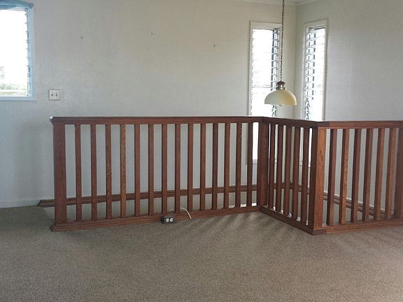 Living room with oak balcony