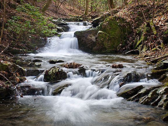 Waterfall at bottom of hill