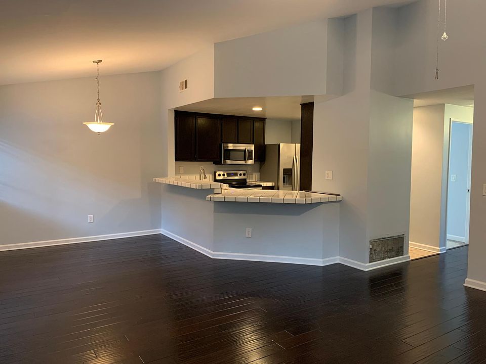 View of dining room and kitchen from living room.
