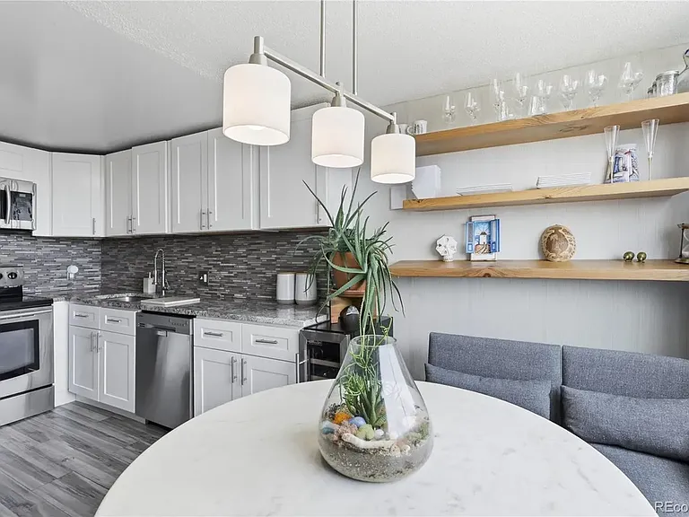 Eat-in kitchen with stainless steel appliances