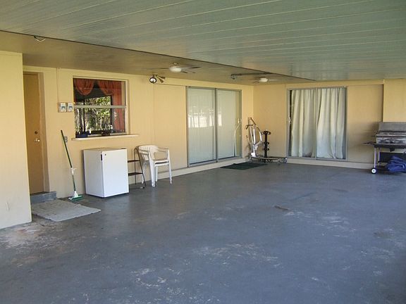 Huge side patio for parties under roof.