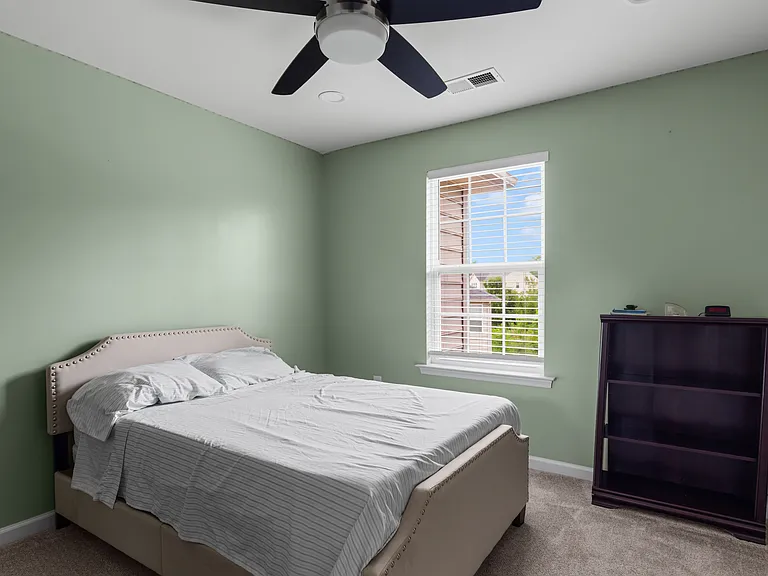 Bedroom 4 _ Shown furnished. If a furnished rental arrangement is agreed upon, the room would be presented as shown.