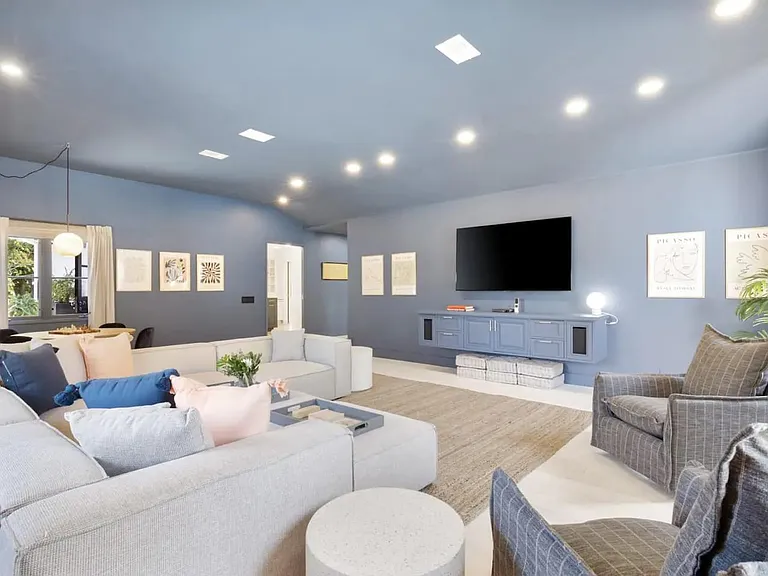 Recessed lighting and homey touches in the living space