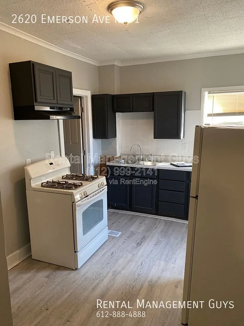 Building Photo - 2620 Emerson Ave N #1