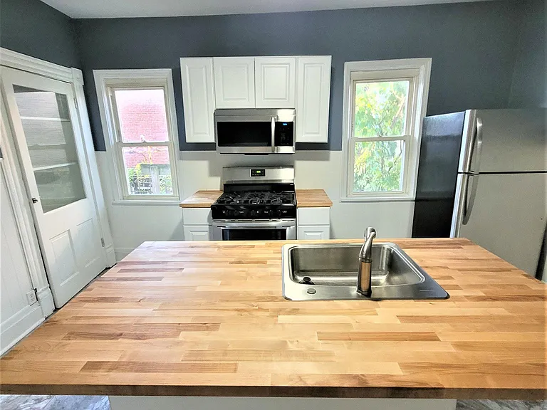 Gorgeous butcher block breakfast bar