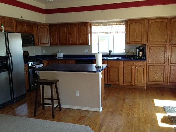 Kitchen with island and stainless steel